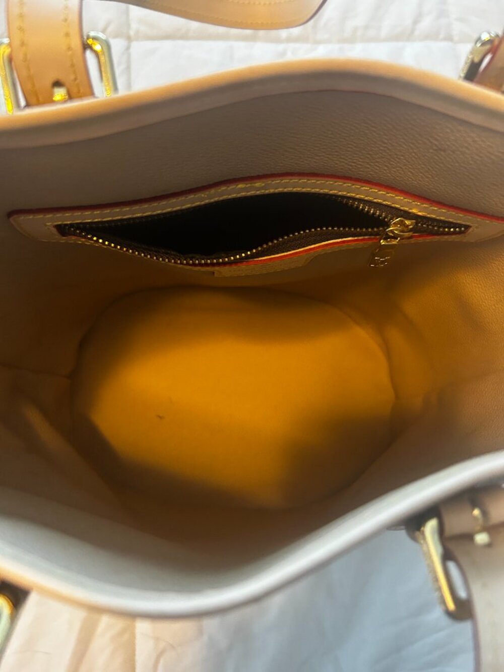 Brown Monogram bucket bag with monogram canvas. - Picture 7 of 7